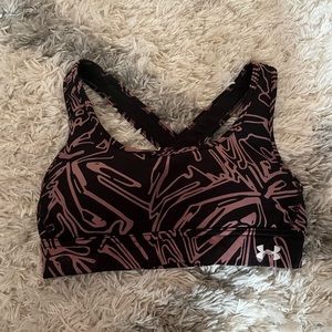 Black and pink Under Armour bra in size XS. Comfy and hardly worn.